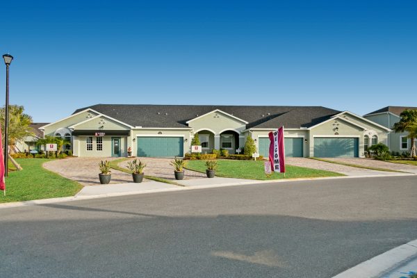 CH_19198 Single-story attached home with two-car garage and screened lanai